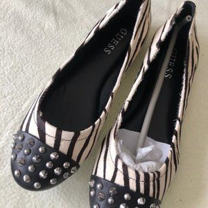Guess cowhide flats with studs